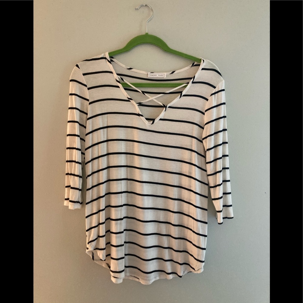 White shirt with black stripes.